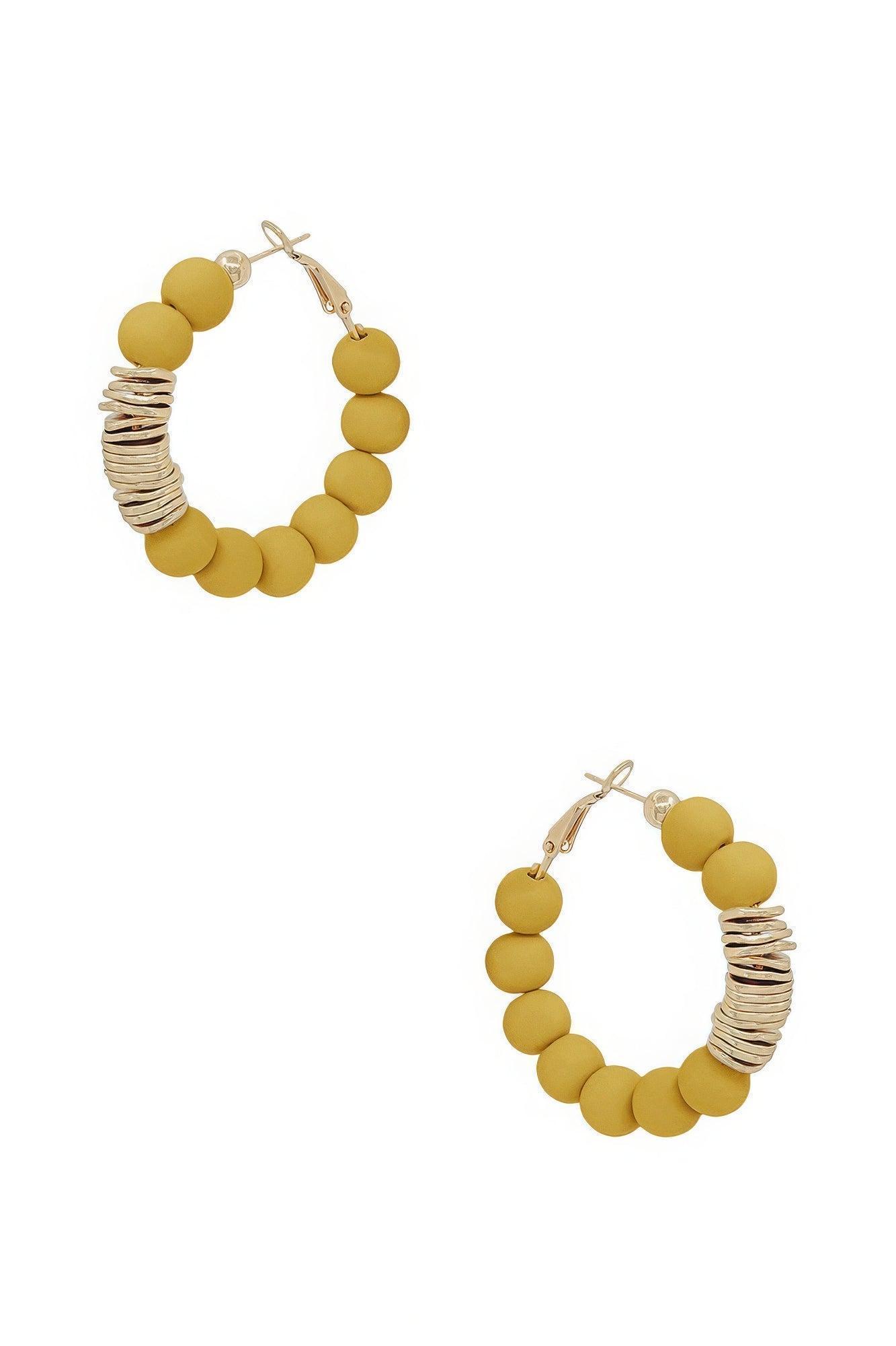 Boucles d'oreilles en boule d'argile en métal