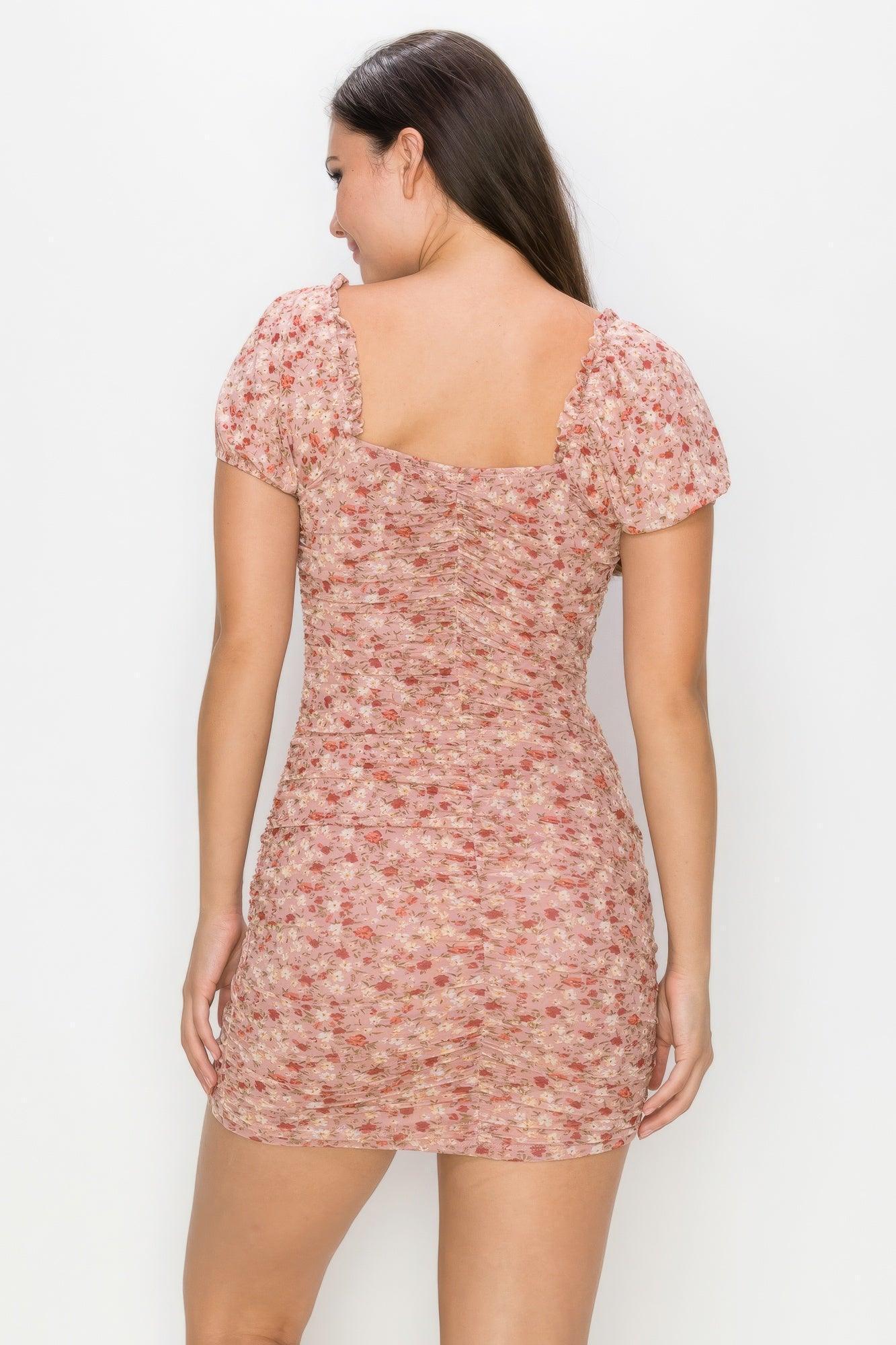 Robe courte moulante à fleurs
